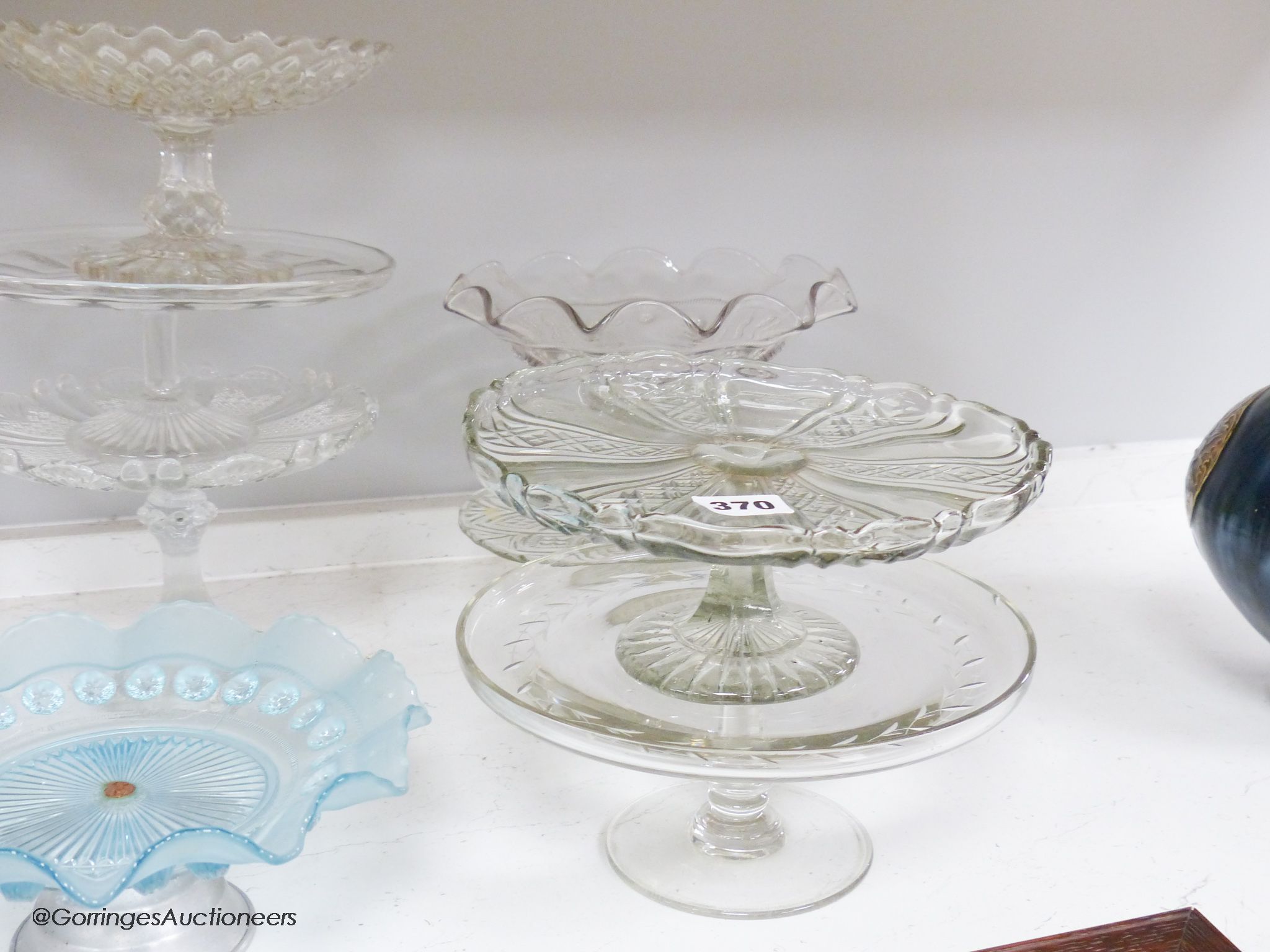 Twelve various glass cake stands